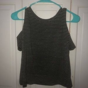 Black and white stripped shirt, shoulders open.